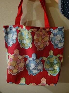 Red Turtle-Print Tote Bag with Multicolor Accents